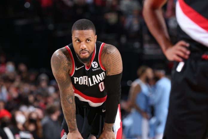 Damian Lillard exits prematurely in Blazers' first loss of season vs Heat due to calf strain