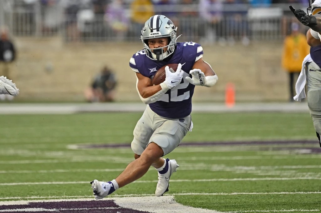 Wildcats or Cowboys? Point Spreads!