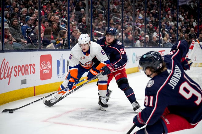 Blue Jackets forward Trey Fix-Wolansky collides with Islanders defenseman Ryan Pulock.