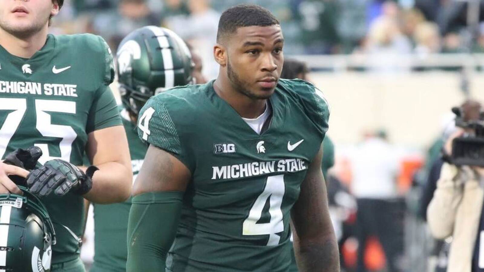 Michigan State suspends four more players for tunnel fight