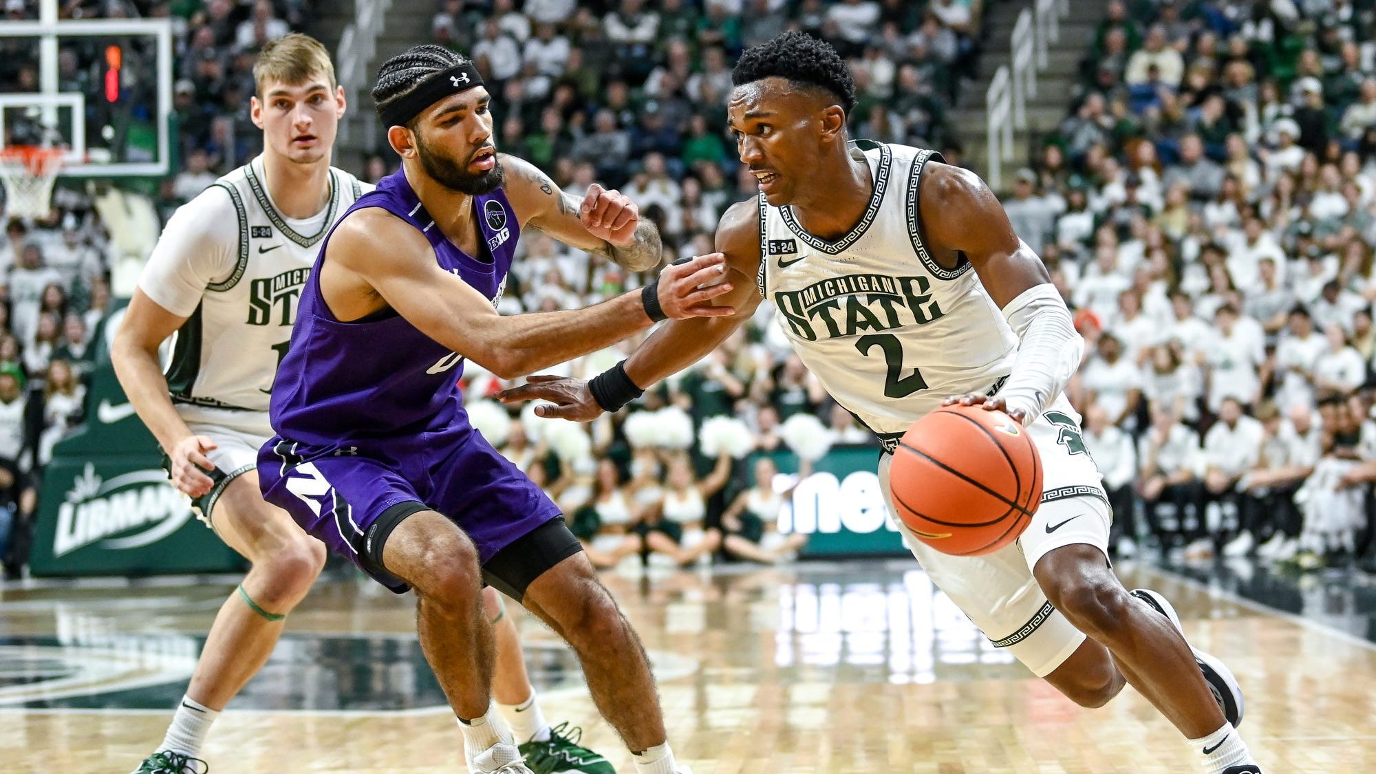 Northwestern beats No. 20 Michigan State in Big Ten opener