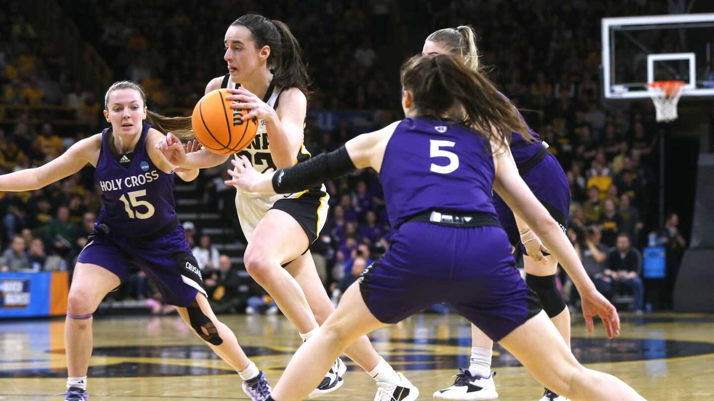 Caitlin Clark has double-double as No. 1 seed Iowa defeats Holy Cross, 91-65