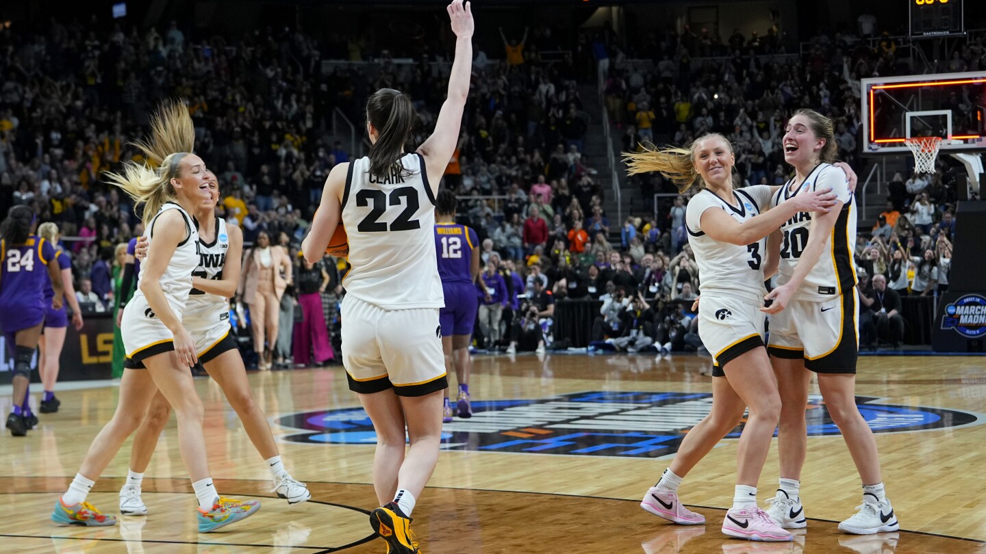 Clark leads Iowa back to Final Four, scoring 41 points in 94-87 win over defending champion LSU