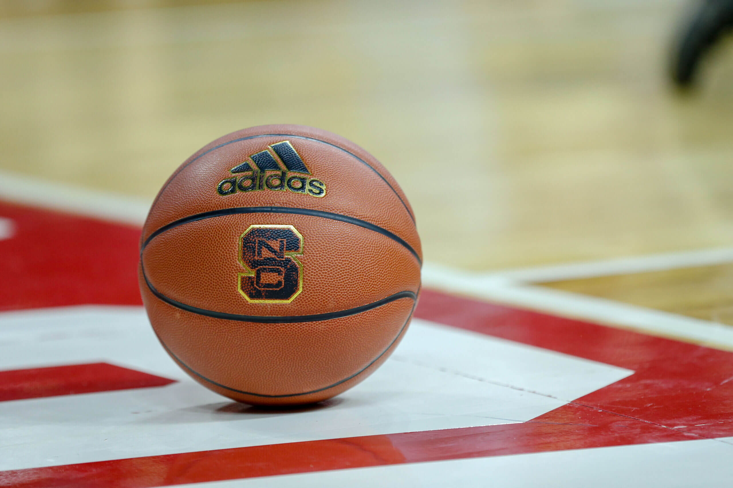 Ten members of 1983 NC State basketball title team sue NCAA over unauthorized NIL use