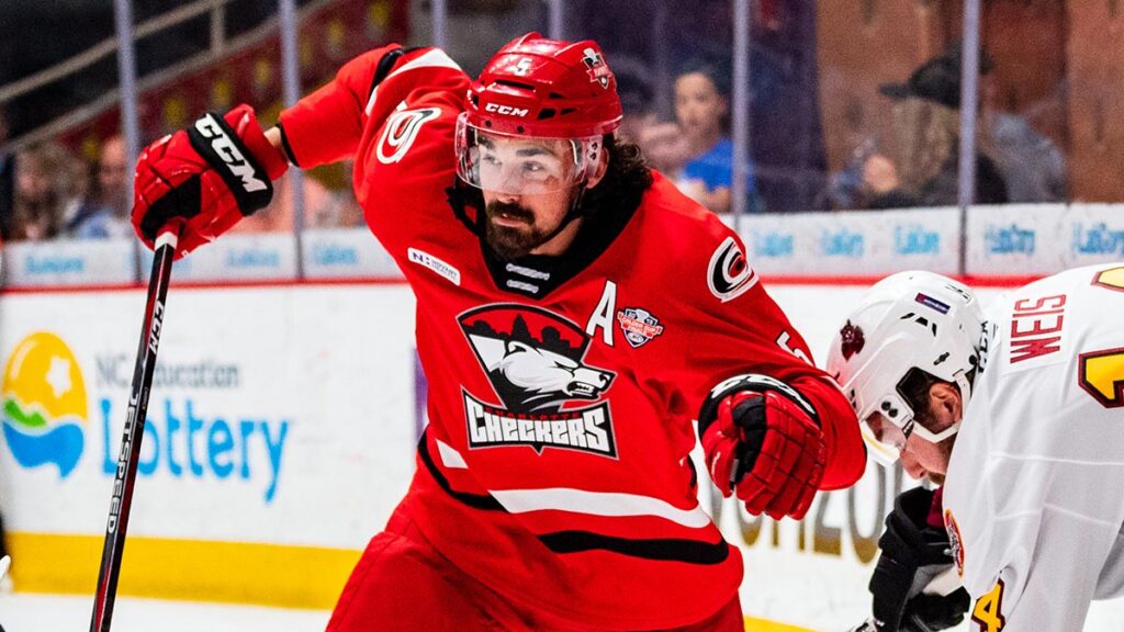 Checkers sign seven, bring back Carrick