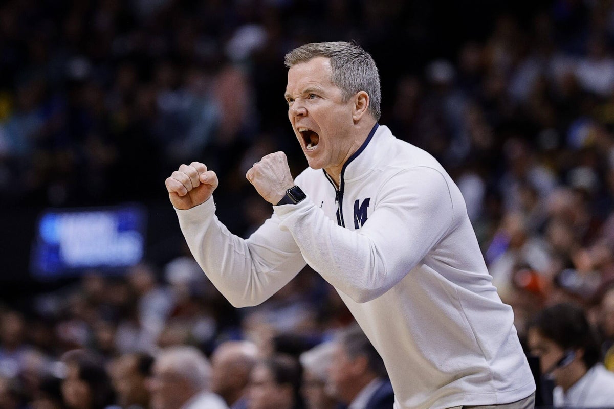 For Michigan coach Dusty May, being an NCAA Tournament favorite was a new experience