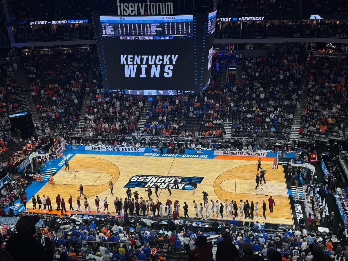 Kentucky’s Mark Pope gives fan ‘1 of 1’ experience at first NCAA tourney game, delivers on free gas pledge