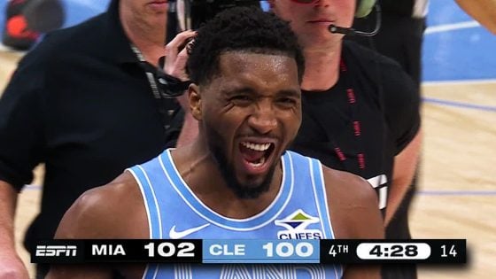 Mitchell leads Cavaliers past Heat to clinch playoff spot