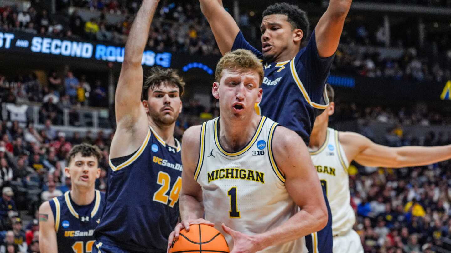 No. 5 seed Michigan holds off UC San Diego 68-65 in March Madness nailbiter
