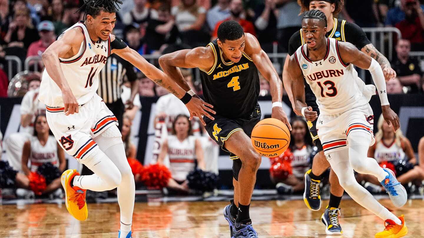 Top-seeded Auburn rallies in 2nd half, beats Michigan 78-65 in Sweet 16 of March Madness