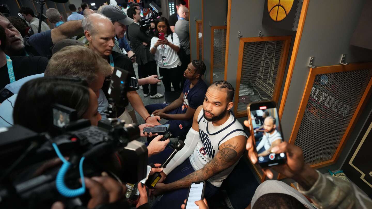Auburn goes from early turbulence with players in the air to landing in the NCAA Final Four