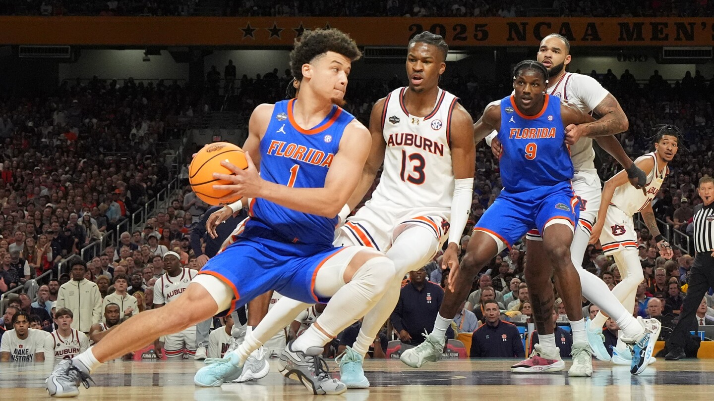 Clayton leads Florida to NCAA title game, scoring 34 points in 79-73 victory over SEC rival Auburn