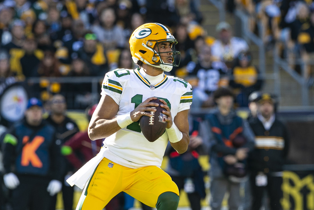 Jordan Love looks to pass as he often does before being featured in Week 3 Fantasy Football Start/Sit Player Stats