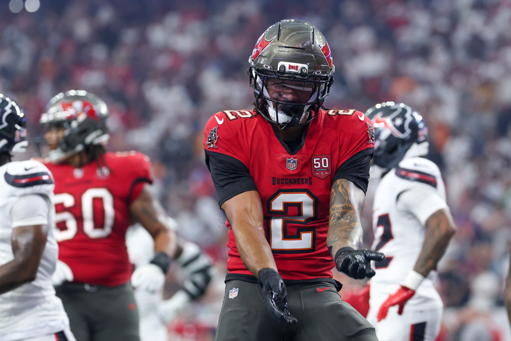 Emeka Egbuka celebrates a touchdown for the Week 10 Fantasy Football Player Rankings Tiers Start Sit QB RB WR TE