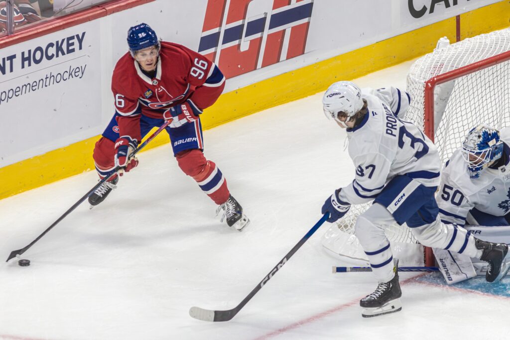 "I've tried to adjust as fast as I can" after returning from Swiss A League, says Laval Rocket winger Vinzenz Rohrer, looking for an opening on Maple Leafs' John Prokop and goalie Vyacheslav Peksa during Prospect Showdown game in Montreal on Sept. 14, 2025.